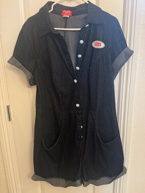 Unique Vintage Denim Piece with Red Coca-Cola Label